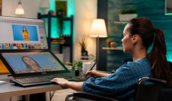 Retouching specialist working on graphic project at studio